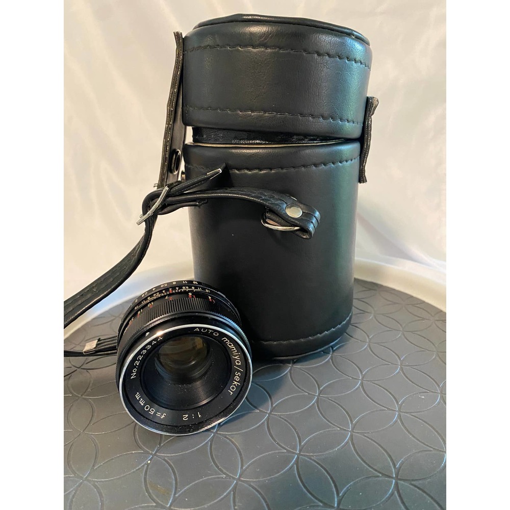Vintage Mamiya/Sekor Auto lens 1:2  f=50mm  no 223344 with leather case.  B421